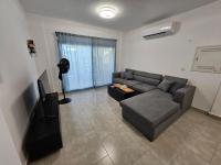 TV a/nebo společenská místnost v ubytování Apartment Chalet in Marassi Greek