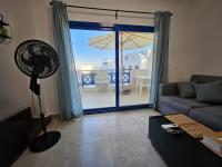 Posezení v ubytování Apartment Chalet in Marassi Greek
