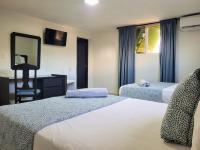 Postel nebo postele na pokoji v ubytování Hotel Olimpo