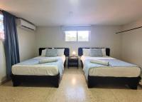 Postel nebo postele na pokoji v ubytování Hotel Olimpo
