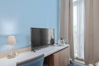 TV a/nebo společenská místnost v ubytování Boutique Hotel Mali Raj