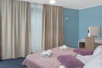 Postel nebo postele na pokoji v ubytování Boutique Hotel Mali Raj