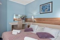 Postel nebo postele na pokoji v ubytování Boutique Hotel Mali Raj
