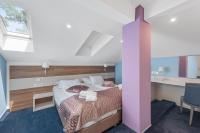 Postel nebo postele na pokoji v ubytování Boutique Hotel Mali Raj
