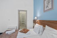 Postel nebo postele na pokoji v ubytování Boutique Hotel Mali Raj