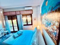 Posteľ alebo postele v izbe v ubytovaní Art Home