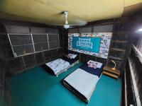 Postel nebo postele na pokoji v ubytování HostelBed and Retreat Phitsanulok