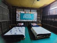 Postel nebo postele na pokoji v ubytování HostelBed and Retreat Phitsanulok