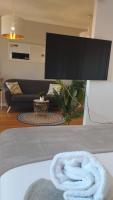 Telewizja i/lub zestaw kina domowego w obiekcie My Suites Madrid - Aeropuerto Ifema