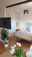 Łóżko lub łóżka w pokoju w obiekcie My Suites Madrid - Aeropuerto Ifema