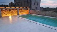 Bazén v ubytování Villa on Biševo - transfer and car included, 5 min to the sea nebo v jeho okolí