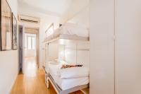 Posteľ alebo postele v izbe v ubytovaní BBHOME Comfort apartment near Colosseum