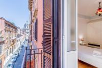 Posteľ alebo postele v izbe v ubytovaní BBHOME Comfort apartment near Colosseum