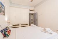 Posteľ alebo postele v izbe v ubytovaní BBHOME Comfort apartment near Colosseum