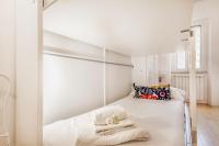 Posteľ alebo postele v izbe v ubytovaní BBHOME Comfort apartment near Colosseum