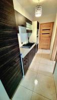 Kuchyňa alebo kuchynka v ubytovaní Solankowy Apartament