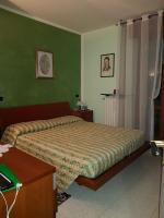 A bed or beds in a room at B&B da Silvana a Talamello
