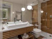 a bathroom with a sink and a toilet and a shower at Hotel Bellevue Dubrovnik in Dubrovnik