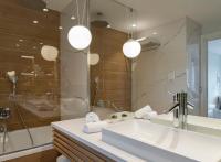 a bathroom with a sink and a shower at Hotel Bellevue Dubrovnik in Dubrovnik