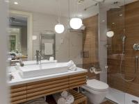 a bathroom with a sink and a toilet and a shower at Hotel Bellevue Dubrovnik in Dubrovnik