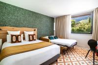 Big Sky Hotel & Spaにあるベッド