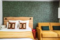 Big Sky Hotel & Spaにあるベッド