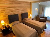 Posteľ alebo postele v izbe v ubytovaní Home & Travel