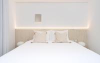 Nathan's Suites On The Beachにあるベッド