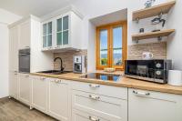 Kuchyňa alebo kuchynka v ubytovaní Holiday house Villa Šilo