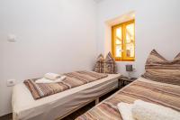 Posteľ alebo postele v izbe v ubytovaní Holiday house Villa Šilo