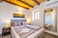 Posteľ alebo postele v izbe v ubytovaní Holiday house Villa Šilo