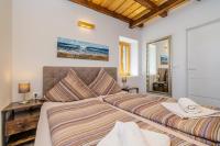 Posteľ alebo postele v izbe v ubytovaní Holiday house Villa Šilo