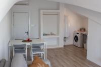 Kuchyň nebo kuchyňský kout v ubytování Aloha Suites