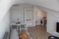 Kuchyň nebo kuchyňský kout v ubytování Aloha Suites