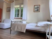 Posteľ alebo postele v izbe v ubytovaní Villa Baltica