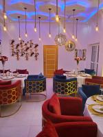 Χώρος καθιστικού στο TOUR EIFFEL HoTEL BENIN