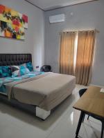 9 Residences Seminyakにあるベッド