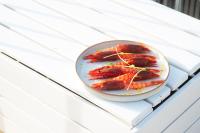 a plate of food on a white table at Hotel Palazzo Papaleo in Otranto