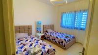 Postel nebo postele na pokoji v ubytování شقه مفروشه فندقيه