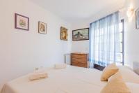 Posteľ alebo postele v izbe v ubytovaní Apartment Zecevo Rtic 10334a
