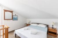 Posteľ alebo postele v izbe v ubytovaní Apartment Zecevo Rtic 10334a