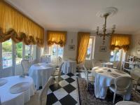 Reštaurácia alebo iné gastronomické zariadenie v ubytovaní Principessa di Savoia
