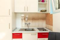 Kuchyň nebo kuchyňský kout v ubytování Apartment Vesna