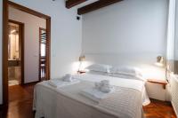 Posteľ alebo postele v izbe v ubytovaní Klimt House