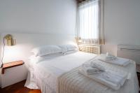 Posteľ alebo postele v izbe v ubytovaní Klimt House