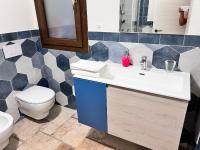 A bathroom at HomeStyle Agorà