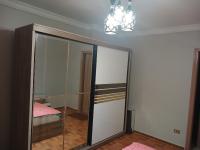Postel nebo postele na pokoji v ubytování كمبوند سيتي تاورز البوشي