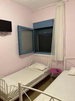 Posteľ alebo postele v izbe v ubytovaní Theros house