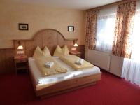 Posteľ alebo postele v izbe v ubytovaní Hotel Garni Landhaus Trenkenbach