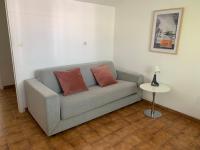 Część wypoczynkowa w obiekcie Appartement familial au bord de la Marne, jardin tropical , piscine, tennis, terrasse, parking gratuit proche Disneyland